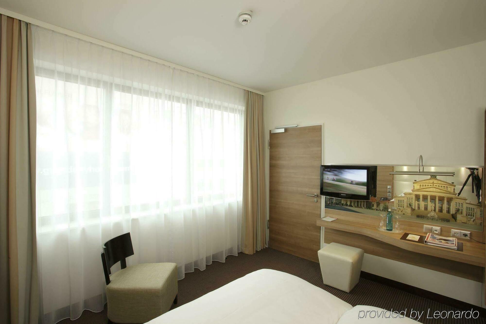 H4 Hotel Berlin Alexanderplatz Chambre photo